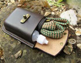 Rifle bore snake pouch